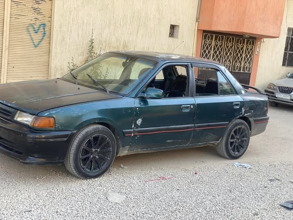 مازدا 323 1997 - صورة 2