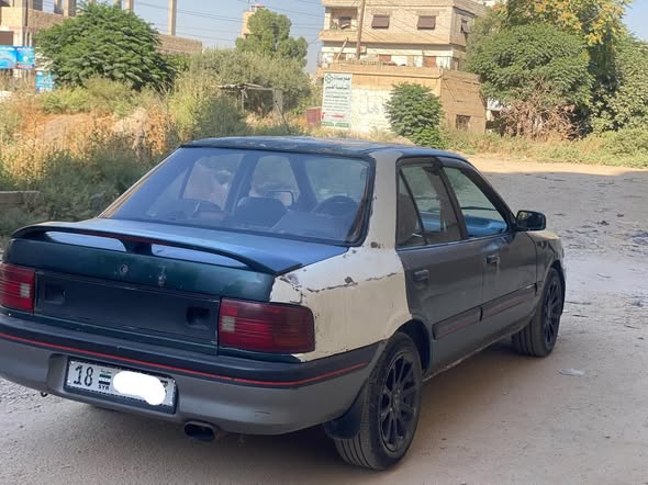 مازدا 323 1997 - صورة 5