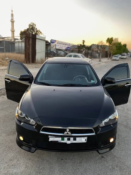 ميتسوبيشي لانسر 2010 - صورة 1