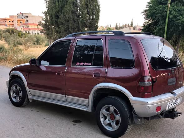 كيا سبورتاج 2001 - صورة 5