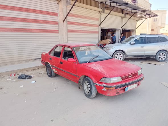 تويوتا كورولا 1996 - صورة 1