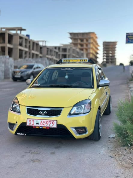 كيا ريو 2011 - صورة 5