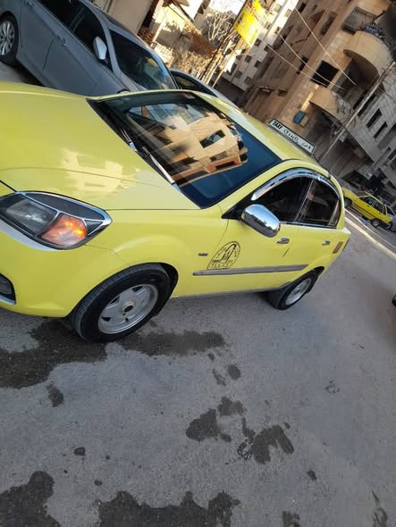 كيا ريو 2010 - صورة 3