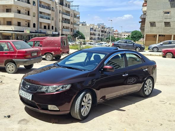 كيا سيراتو 2011 - صورة 4