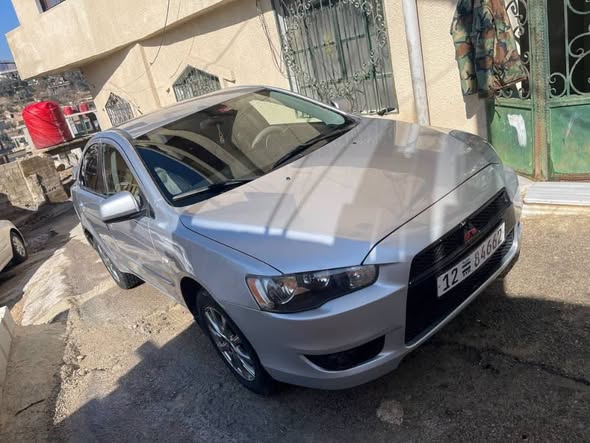 ميتسوبيشي لانسر 2011 - صورة 3