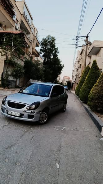ديهاتسو سيريون 2004 - صورة 1