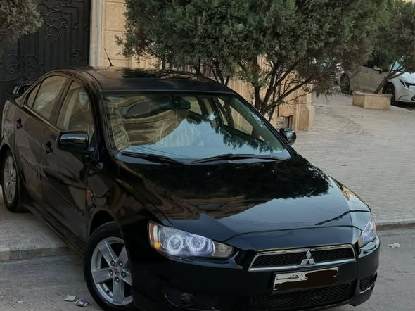 ميتسوبيشي لانسر 2010 - صورة 5
