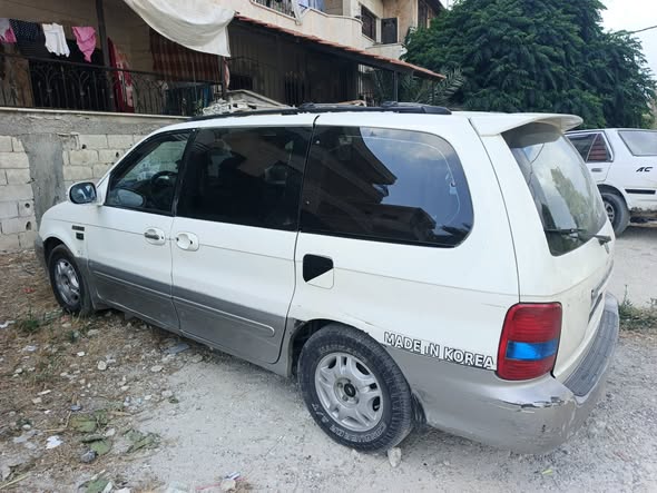 كيا كرنفال 2003 - صورة 3