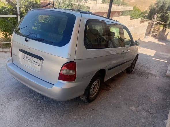 كيا كرنفال 2002 - صورة 2