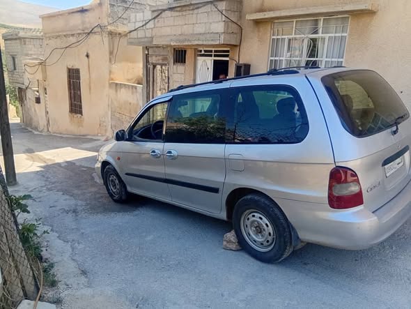 كيا كرنفال 2002 - صورة 5