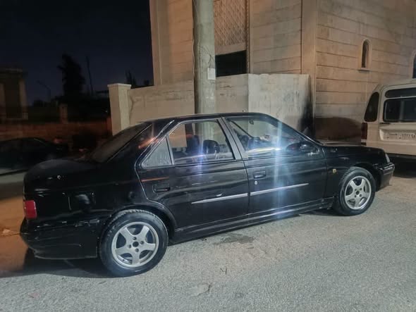 بيجو بارس 2002 - صورة 3