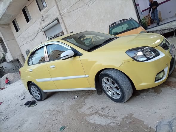 كيا ريو 2011 - صورة 1