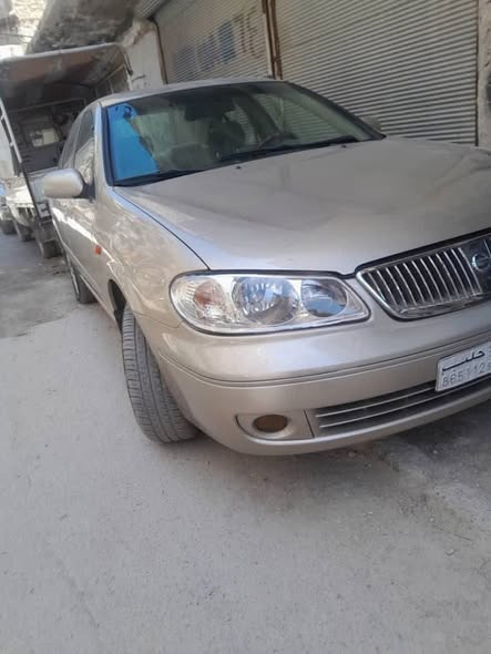 نيسان صني 2003 - صورة 1