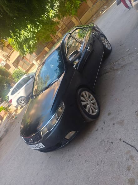 كيا فورتي 2012 - صورة 1