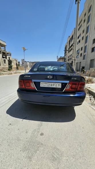 كيا اوبتيما 2004 - صورة 4