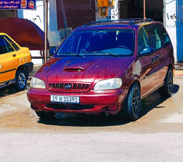 كيا كرنفال 2000 - صورة 1