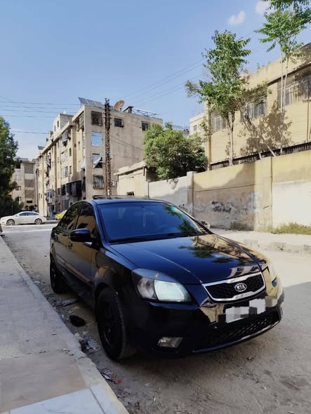 كيا ريو 2011 - صورة 2