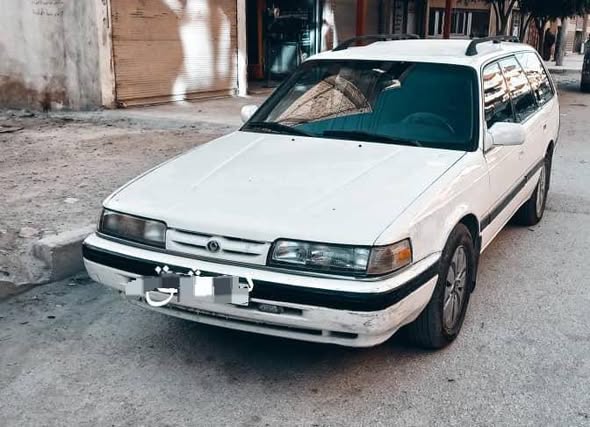 مازدا كرت 1996 - صورة 1