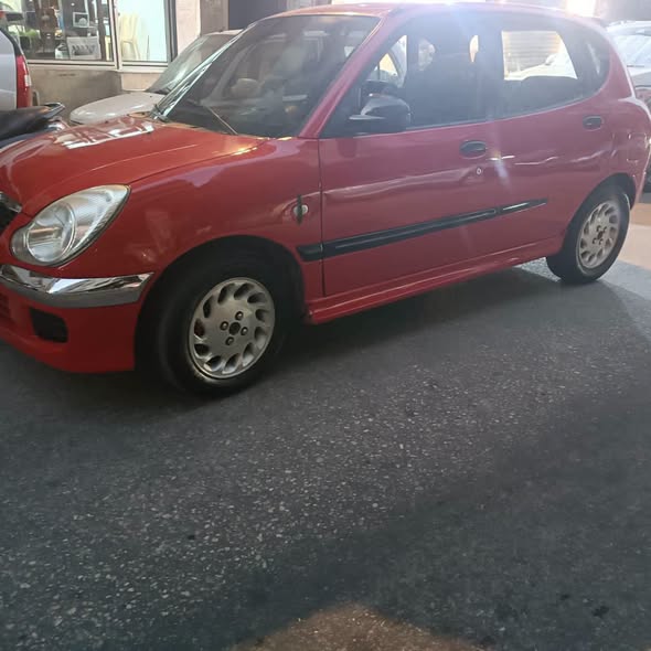 دايهاتسو سيريون 2004 - صورة 1