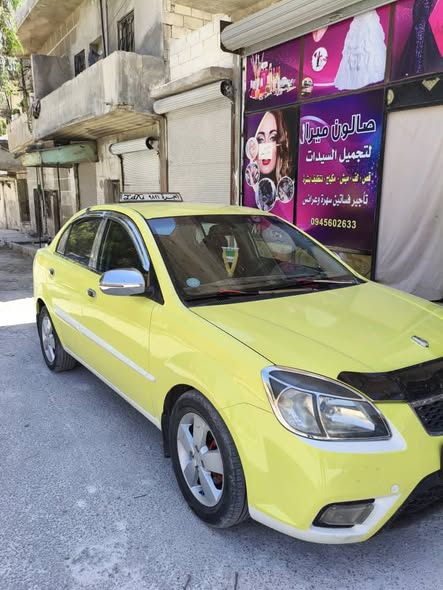 كيا ريو 2011 - صورة 4