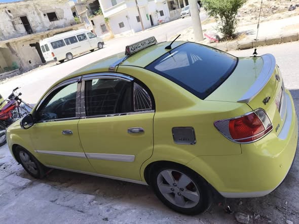 كيا ريو 2011 - صورة 5