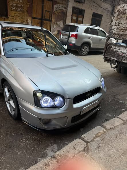سوبارو امبريزا 2003 - صورة 1