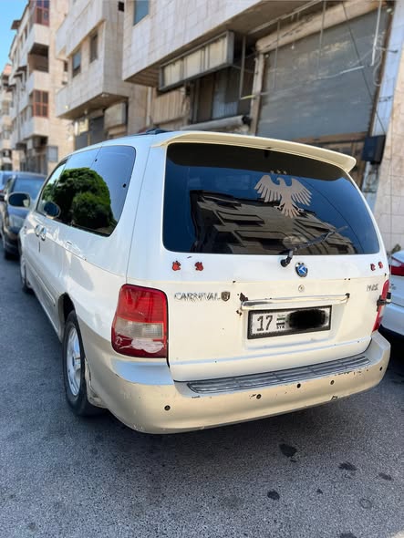 كيا كرنفال 2002 - صورة 1