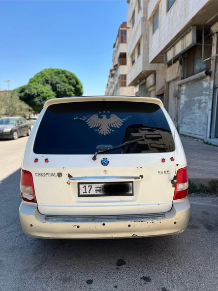 كيا كرنفال 2002 - صورة 2