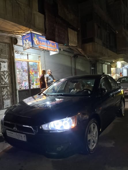 متسوبيشي لانسر 2009 - صورة 2