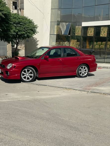 سوبارو امبريزا 2002 - صورة 4