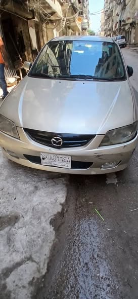 مازدا 323 2002 - صورة 1