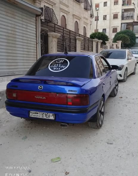 مازدا 323 1993 - صورة 1