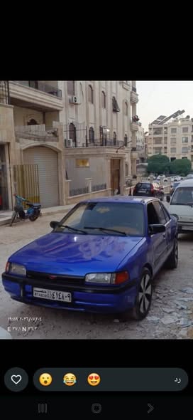 مازدا 323 1993 - صورة 3