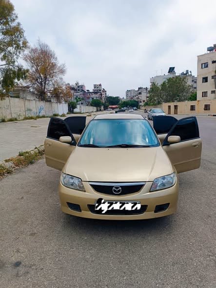 مازدا 323 2003 - صورة 1