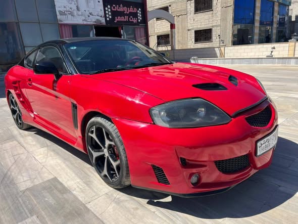هيونداي كوبيه 2004 - صورة 4