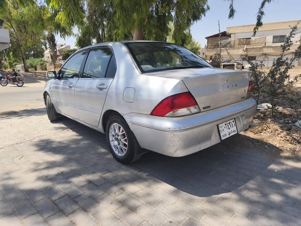مستسوبيشي لانسر 2002 - صورة 2