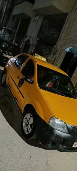 رينو لوغان 2005 - صورة 2