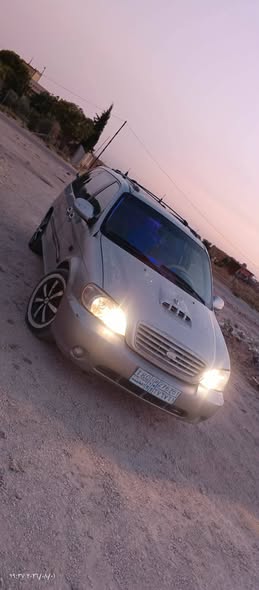 كيا كرنفال 2003 - صورة 1