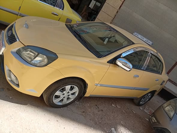 كيا ريو 2011 - صورة 1