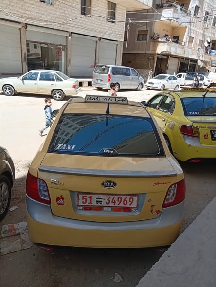 كيا ريو 2011 - صورة 3