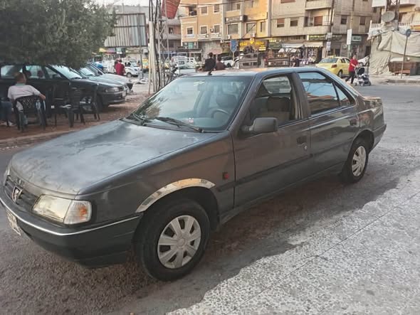 بيجو روى 2005 - صورة 3