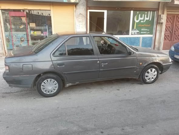 بيجو روى 2005 - صورة 5