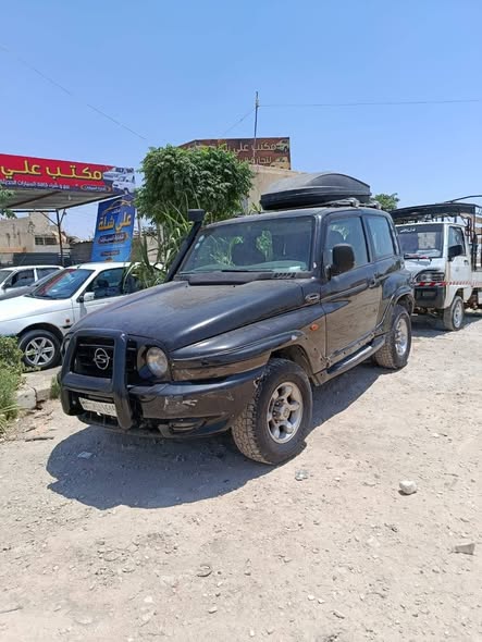 سانغ يونغ كوراندو 1998 - صورة 1