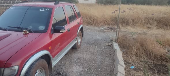 كيا سبورتاج 2002 - صورة 1