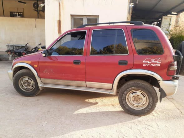كيا سبورتاج 2002 - صورة 2
