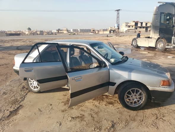 مازدا 323 1993 - صورة 1