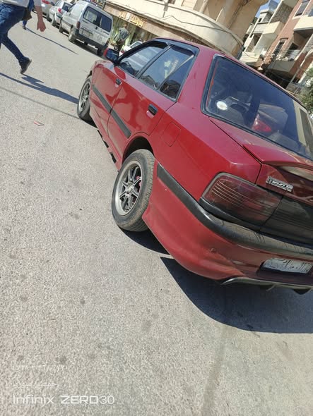 مازدا 323 1993 - صورة 2