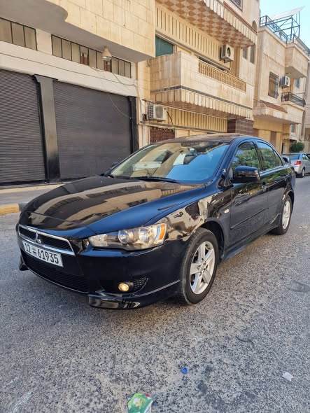 ميتسوبيشي لانسر 2009 - صورة 4
