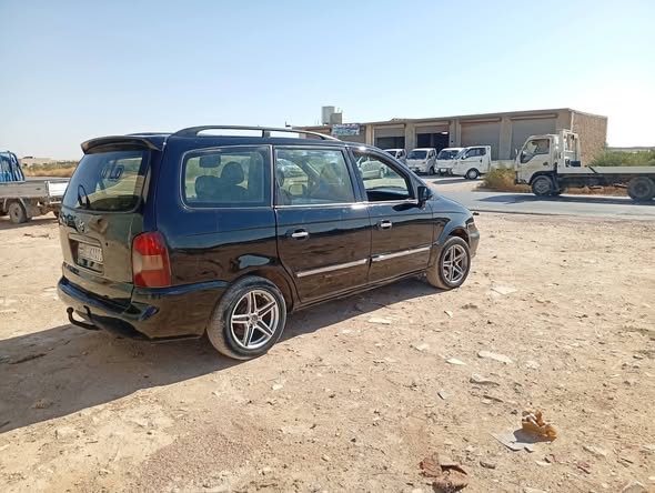 هونداي تراجيت 2004 - صورة 1