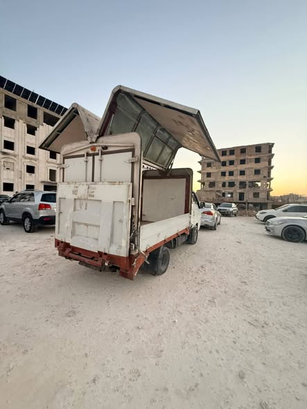 كيا بانجو 2007 - صورة 3